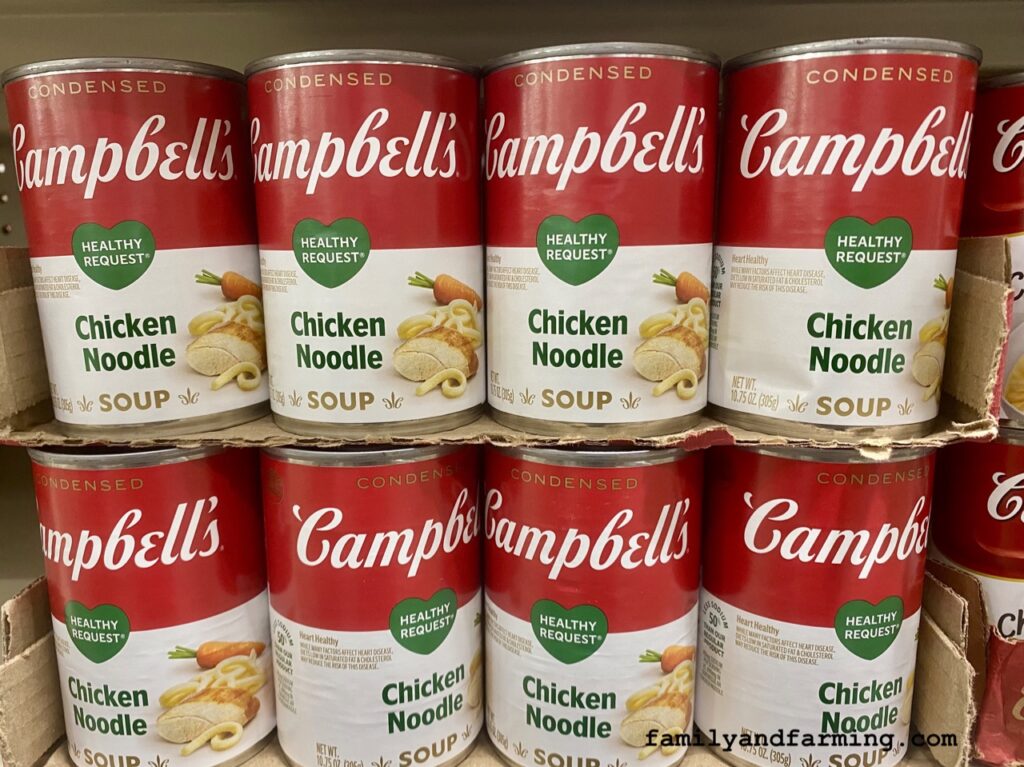 Cans of Chicken Noodle Soup on a Shelf
