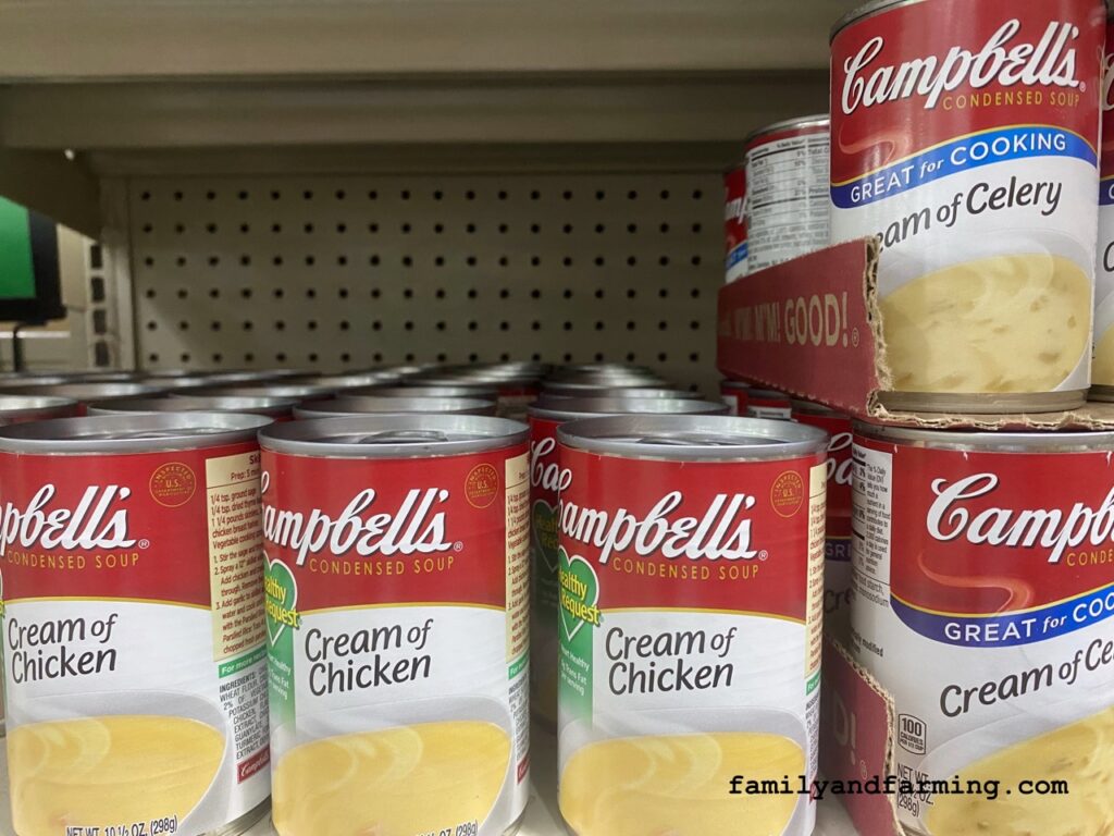 Cans of Cream of Chicken Soup on a Shelf