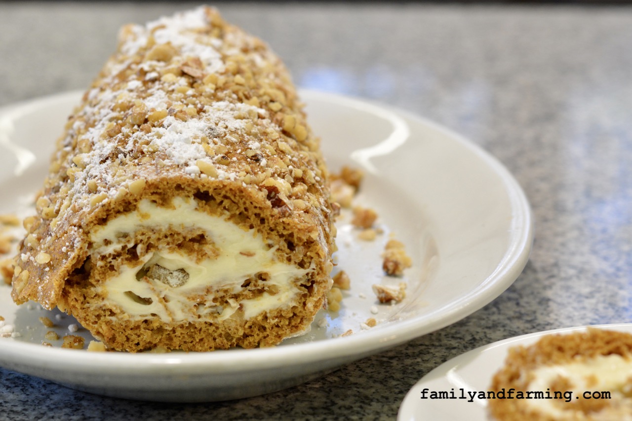 Photo of a pumpkin roll with nuts